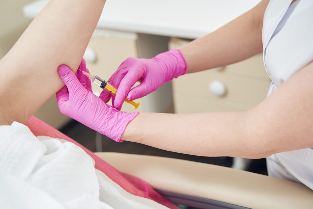 photo of woman's arm getting a lipotropic injection